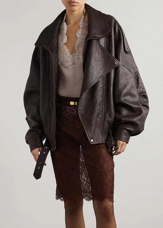 Jesie-London Esme women's oversized leather bomber jacket displayed on a hanger, showing its sleek black design and oversized fit.