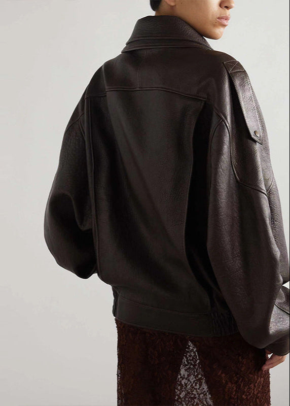 Women’s oversized leather bomber jacket by Jesie-London, featuring a stylish, relaxed fit with detailed stitching and classic design.
