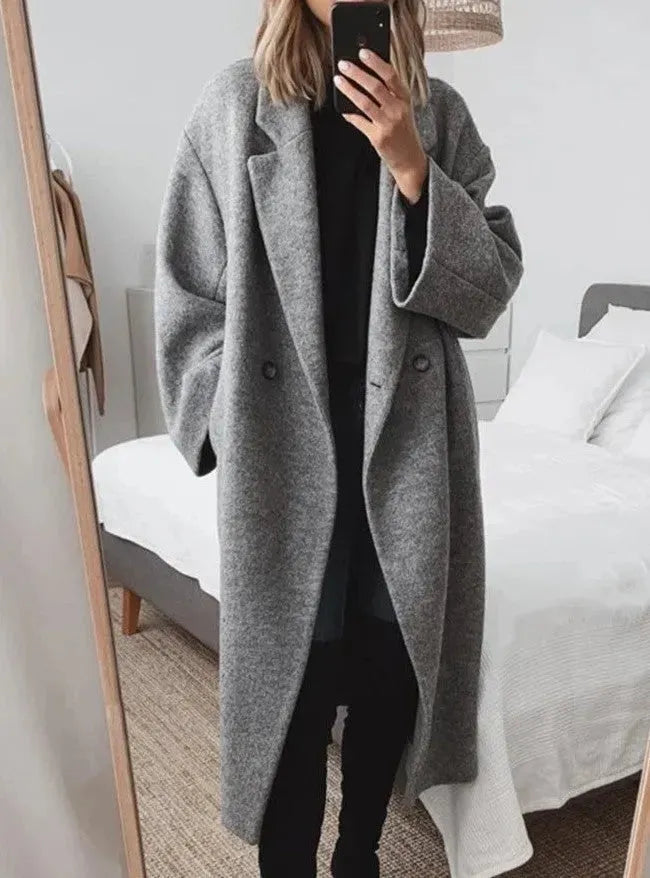Jesie-London Eva women's relaxed fit long coat in chic style, shown in a natural, stylish pose with neutral background.