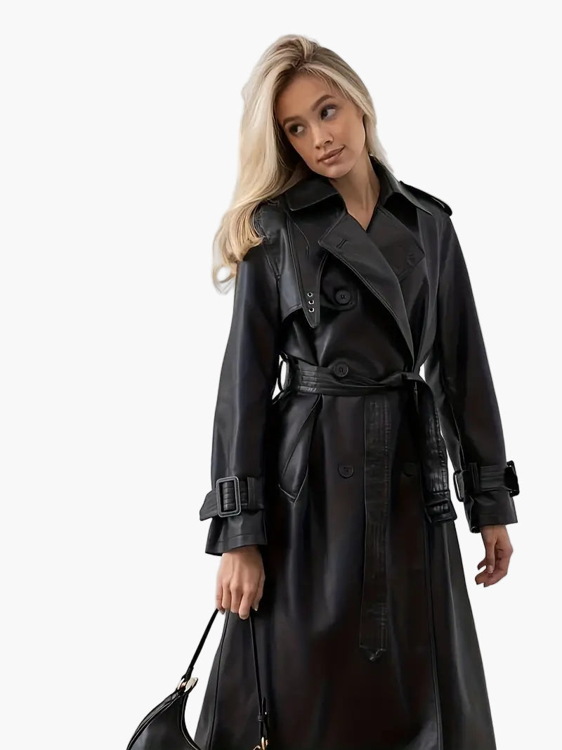 Women’s double-breasted trench coat by Jesie-London, featuring classic design and stylish details, shown on a model.