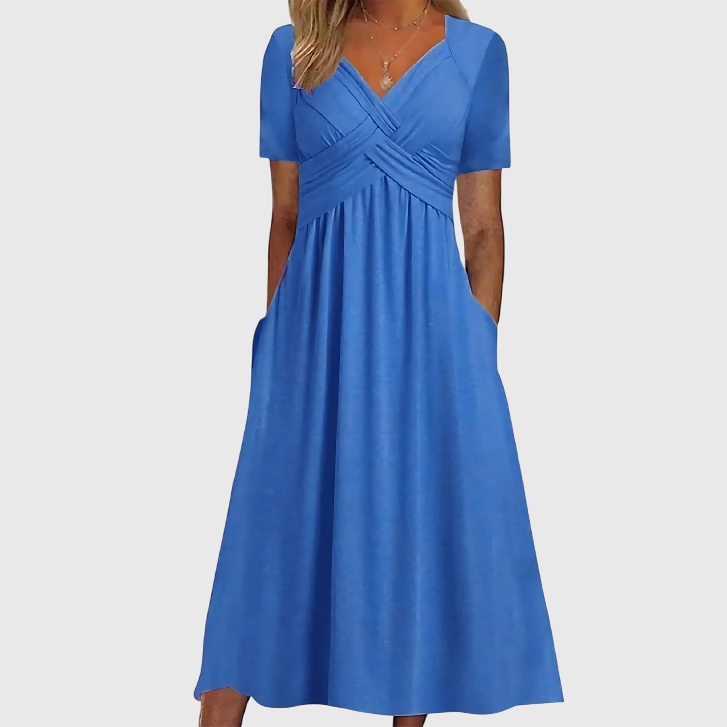 Jesie-London Megan women's v-neck flowy midi dress, shown in a stylish design with a relaxed fit and elegant silhouette.
