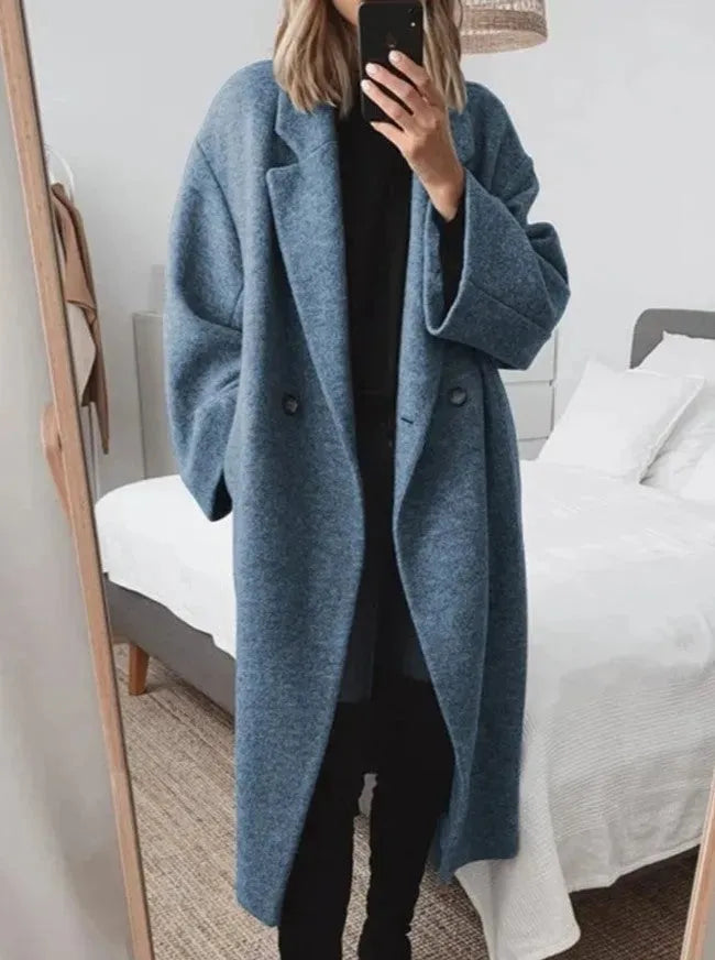 Jesie-London Eva women's relaxed fit long coat in chic style, shown in a neutral color with a tailored silhouette and classic lapel collar.