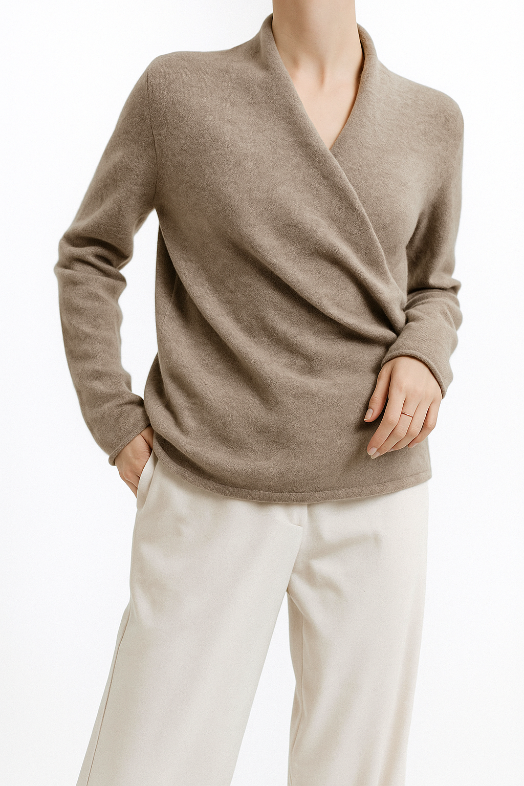 Women’s winter V-neck knit sweater by Jesie-London, Elizabeth, shown in motion with a cozy, elegant design.