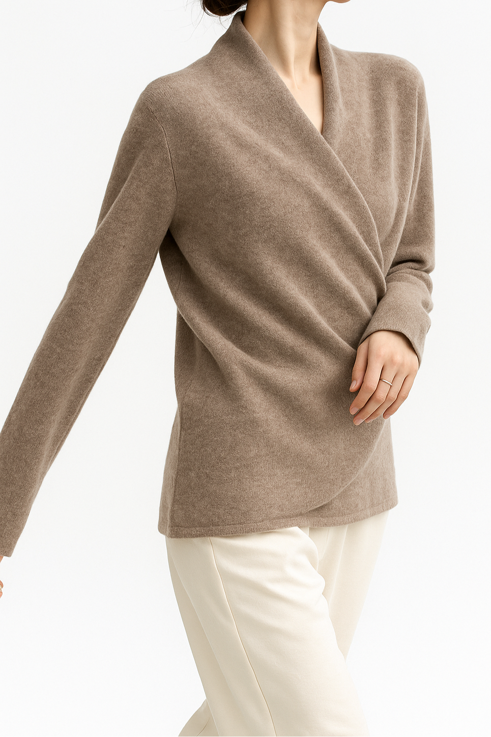 Jesie-London Elizabeth women's winter wrap V-neck knit sweater in cozy wool yarn, shown in a motion shot highlighting its elegant design.
