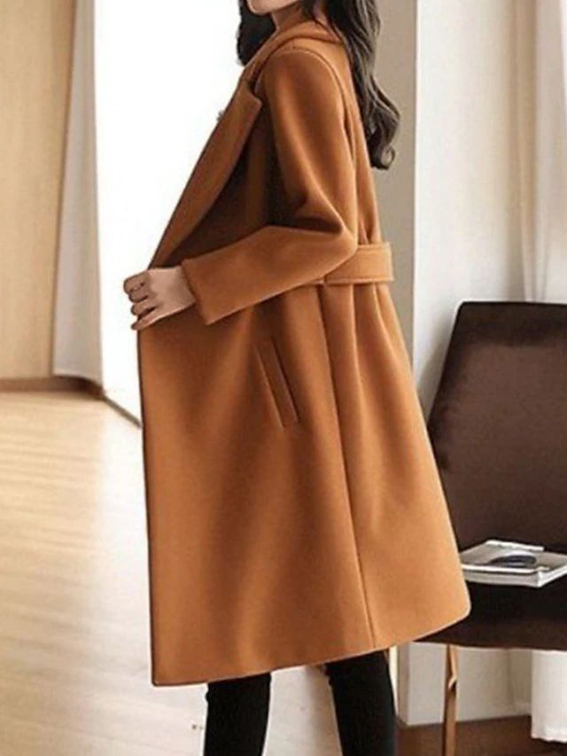 Elegant women’s long formal trench coat by Jesie-London, featuring a tailored fit and classic design in a sophisticated style.