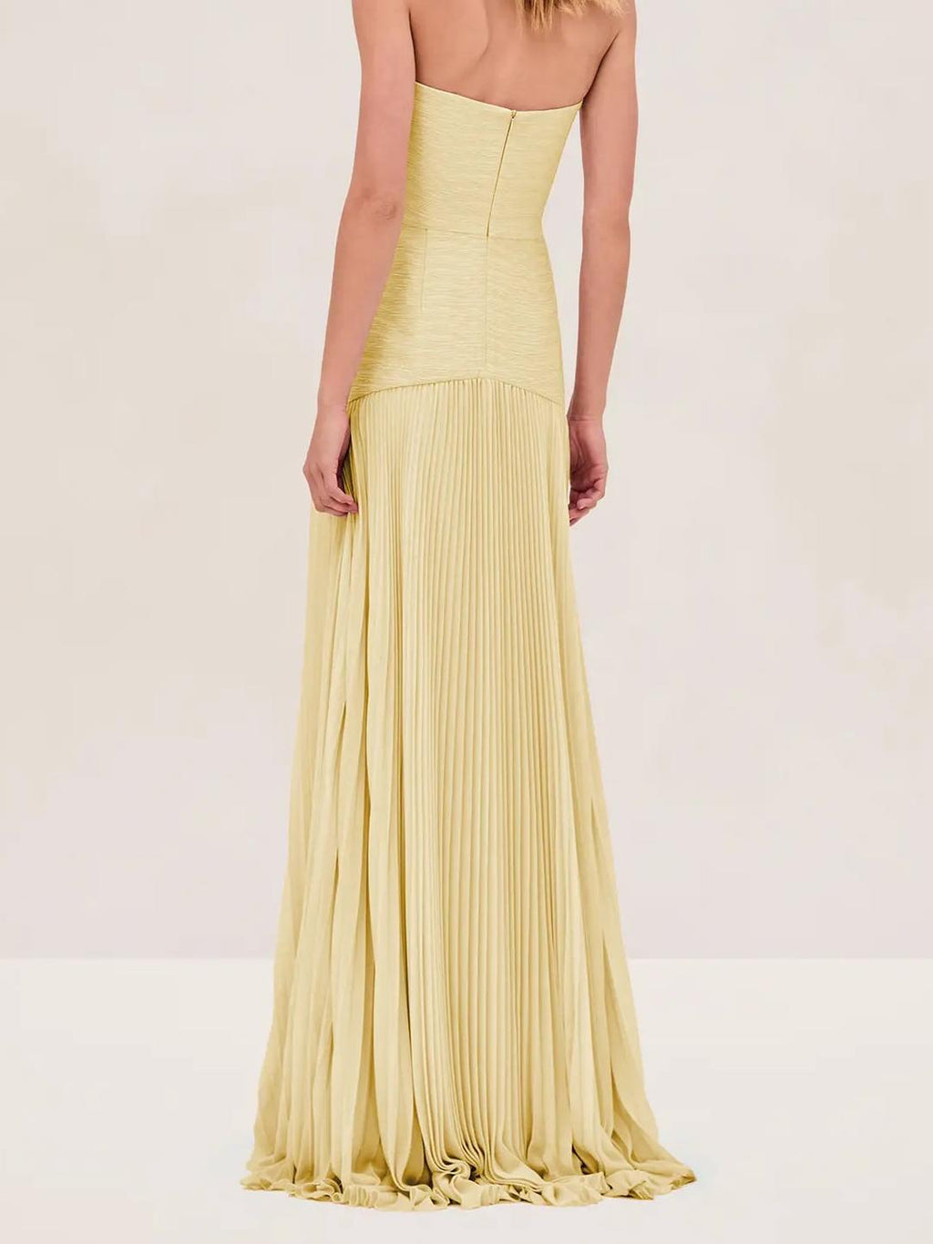 Jesie-London Clara women's strapless pleated maxi wedding guest dress with flowing fabric and elegant design.