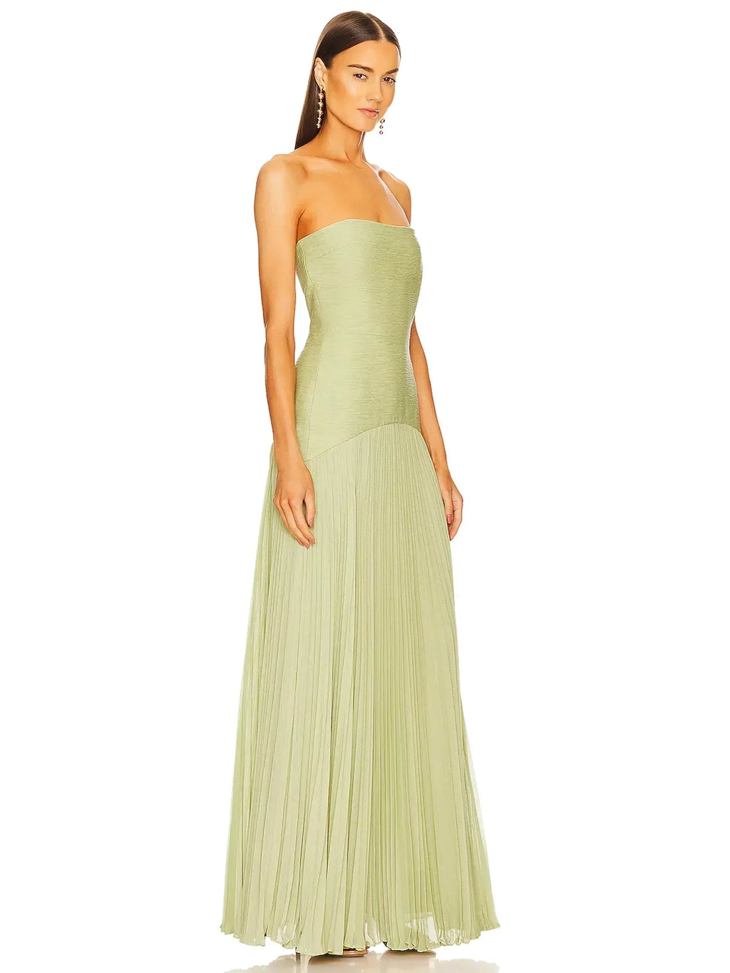 Clara women's strapless pleated maxi wedding guest dress by Jesie-London, shown in a flowing, elegant style with pleats and a fitted bodice.