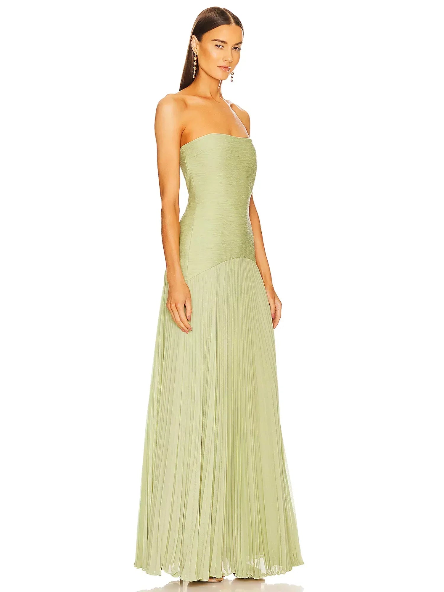 Clara women's strapless pleated maxi wedding guest dress by Jesie-London, shown in a flowing, elegant style with pleats and a fitted bodice.