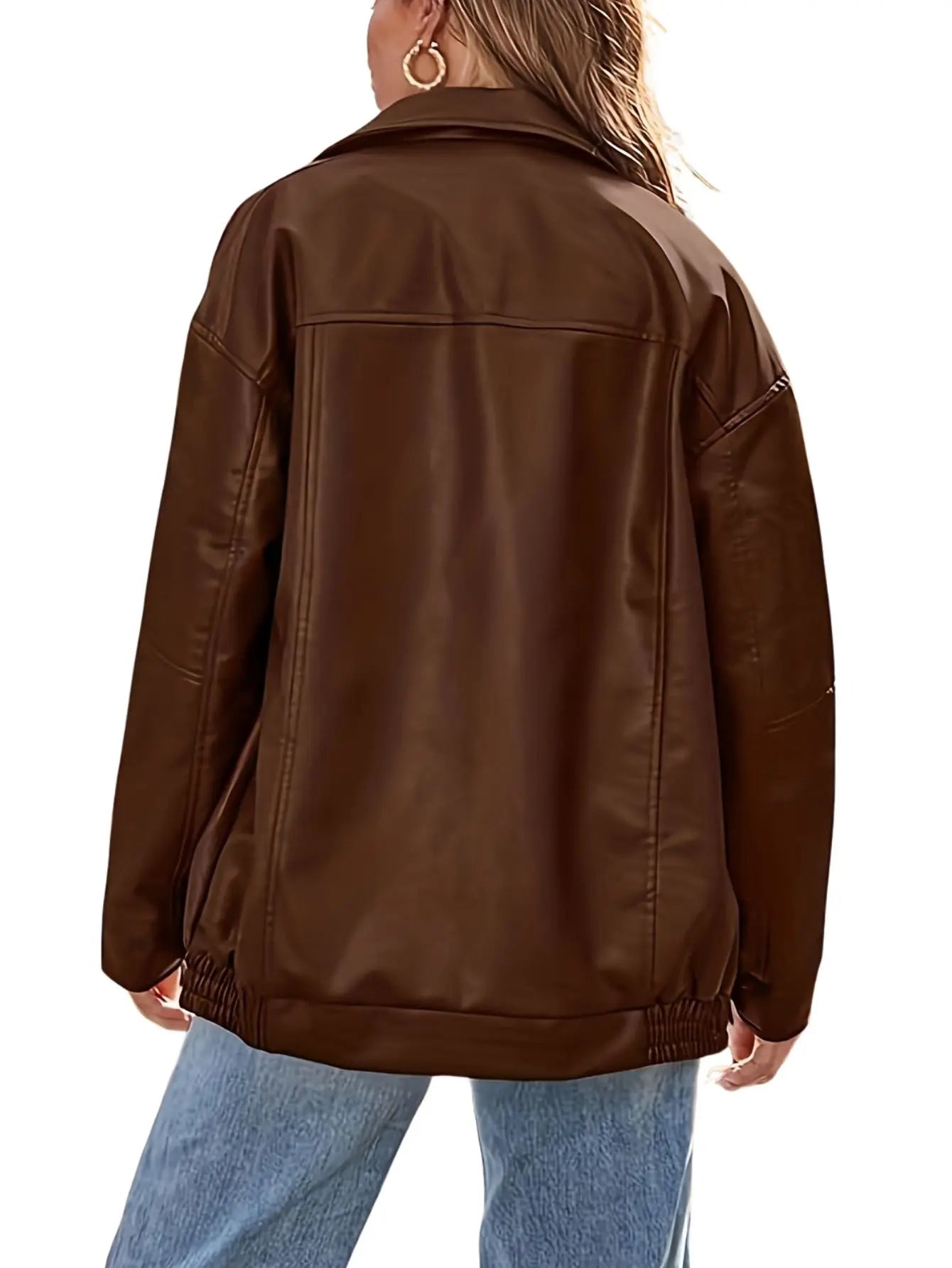 Jesie-London Eloise women's oversized leather bomber jacket displayed on a hanger, showcasing its classic design and structured fit.