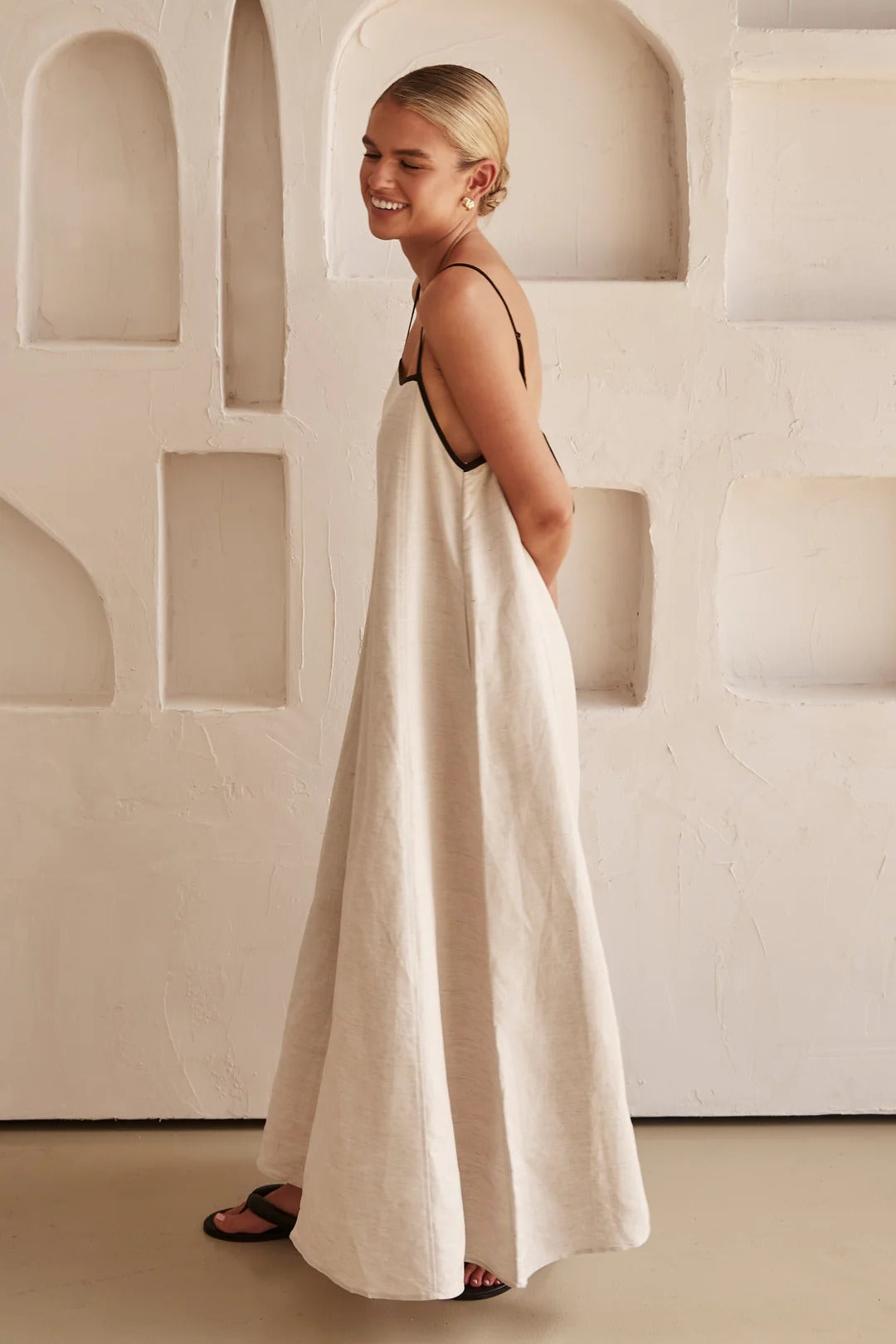 Jesie-London Florence women's spaghetti strap maxi dress for wedding guests, featuring a flowy silhouette and elegant design.