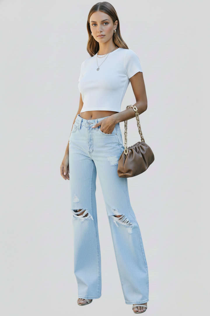Laura women's wide-leg distressed high-waist jeans by Jesie-London, shown in a casual fit with ripped details and high-rise design.