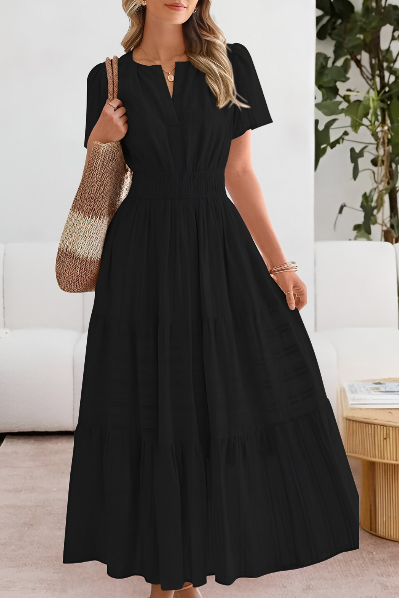 Jesie-London Alice women's boho short sleeve smocked midi dress with floral pattern, lightweight and flowy fabric.