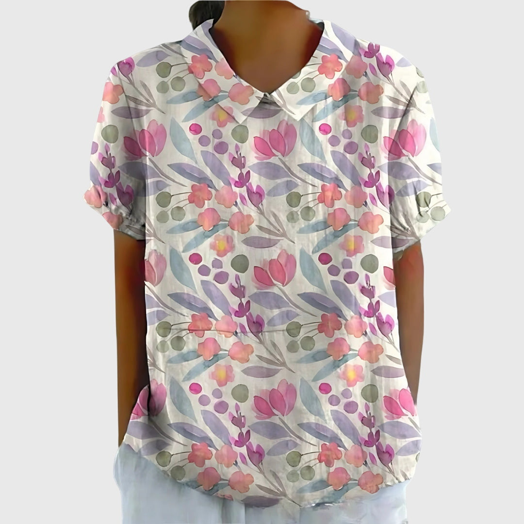 Jesie-London Eleanor women's floral collar short sleeve blouse with a stylish design and vibrant floral print.