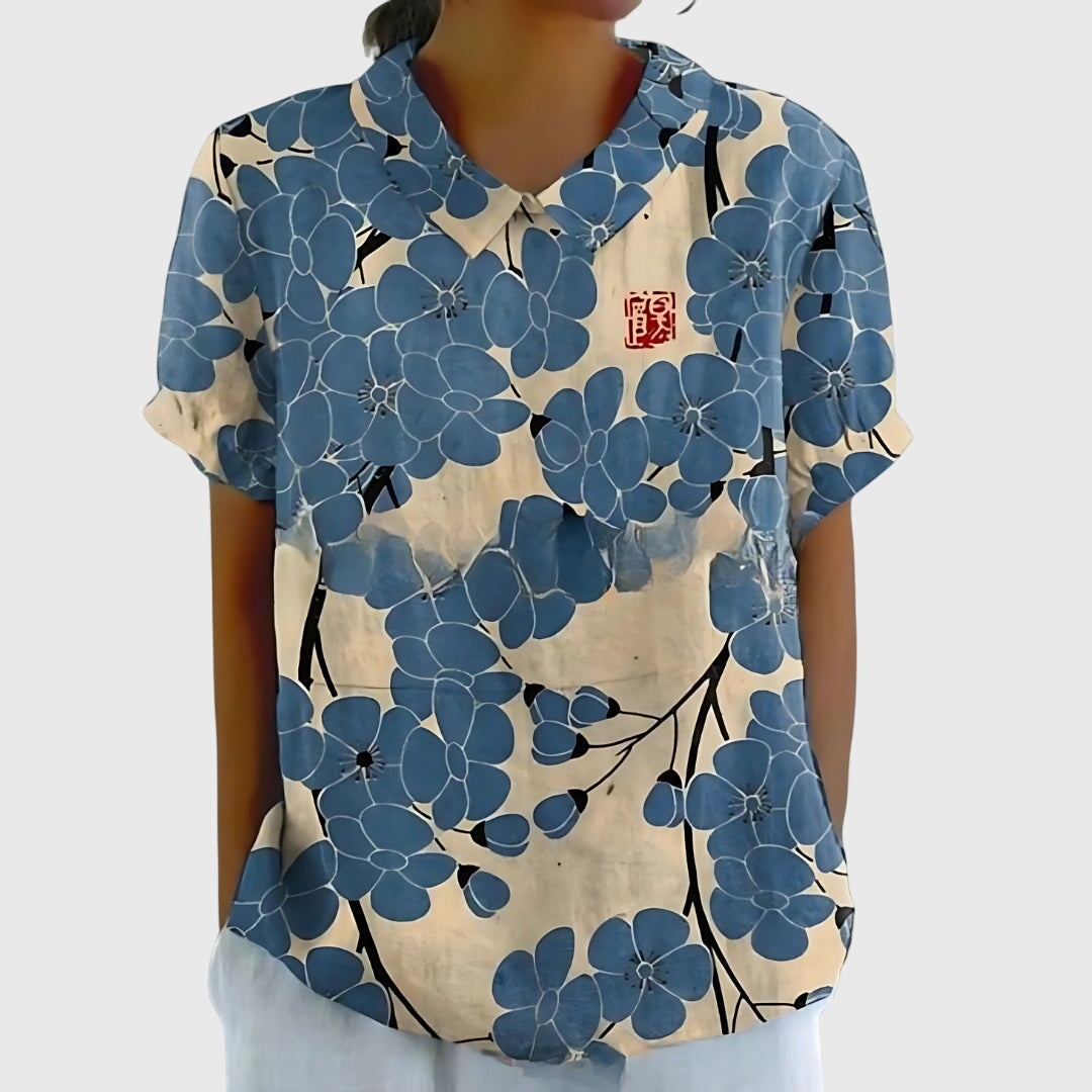 Jesie-London Eleanor women's floral collar short sleeve blouse with a stylish design and vibrant floral pattern.