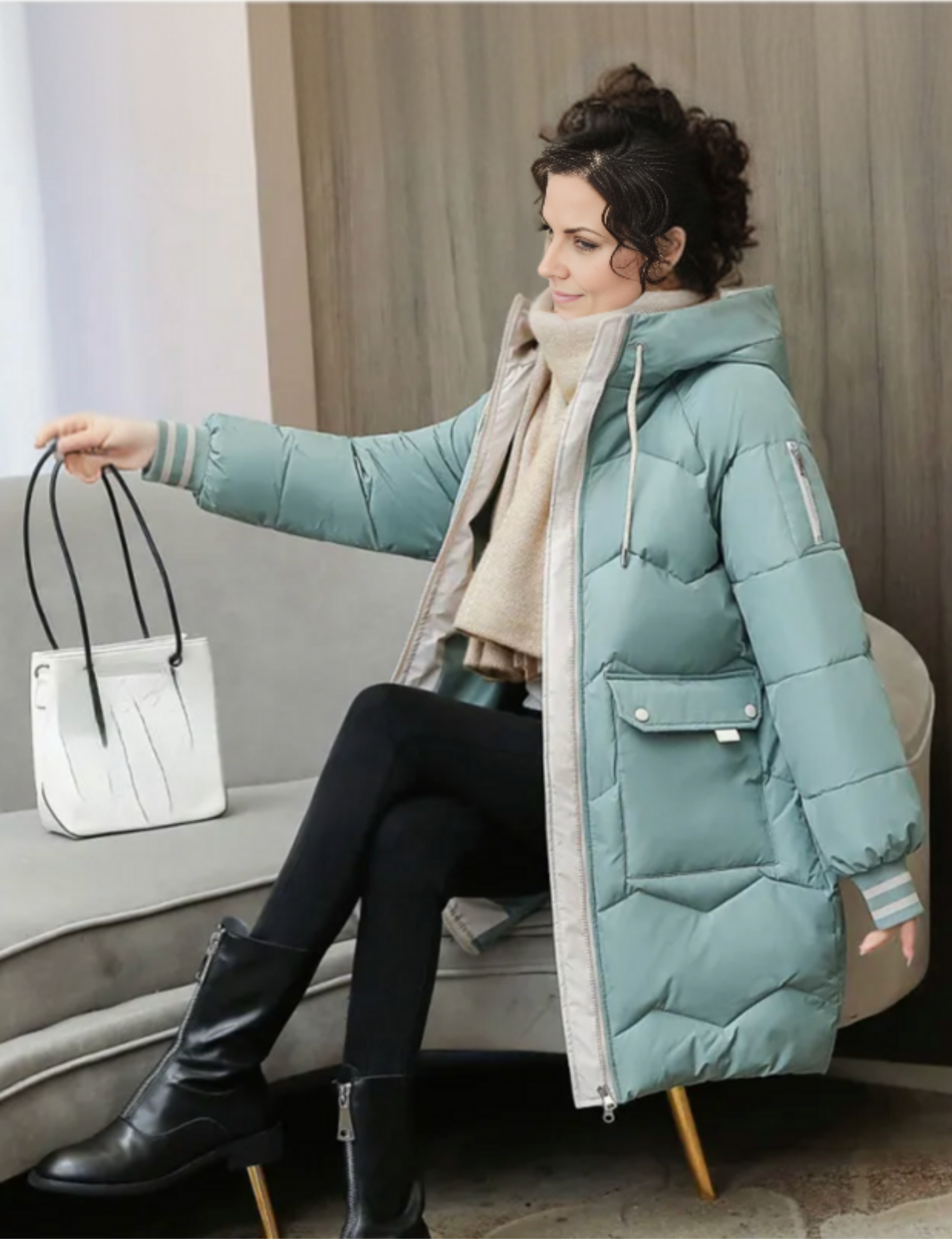 Jesie-London Freya women's hooded long winter jacket in warm, insulated fabric with a cozy hood and stylish design.