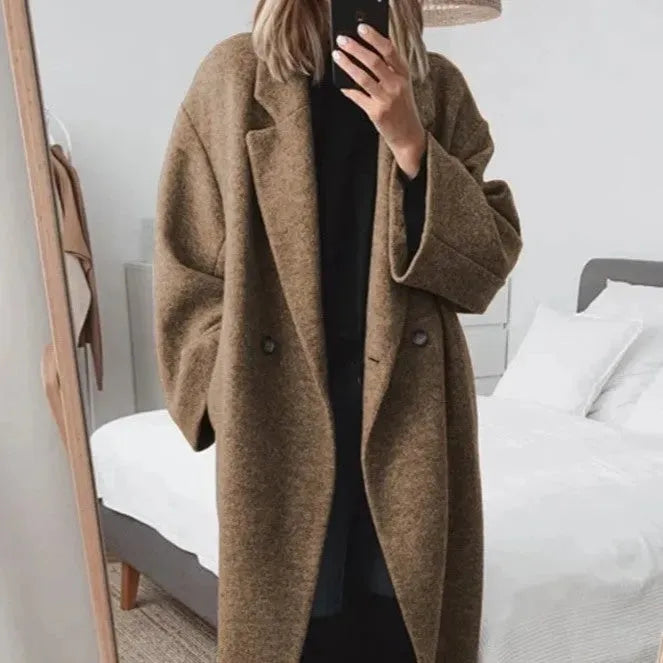 Jesie-London Eva women's relaxed fit long coat in chic style, shown in a neutral color with a tailored silhouette.