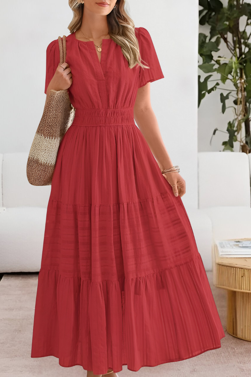 Jesie-London Alice women's boho short sleeve smocked midi dress with flowy fabric and relaxed fit, displayed on a hanger.