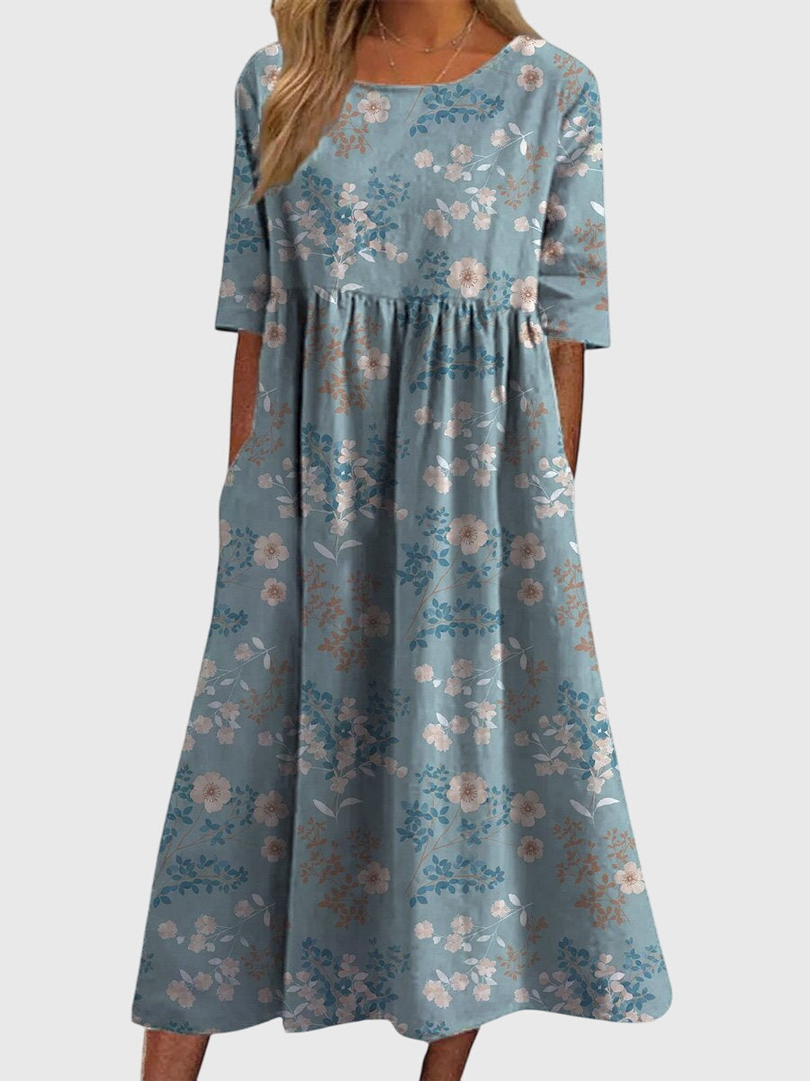 Womens vintage floral midi dress in ruby red by Jesie-London, featuring a classic floral pattern and midi length.
