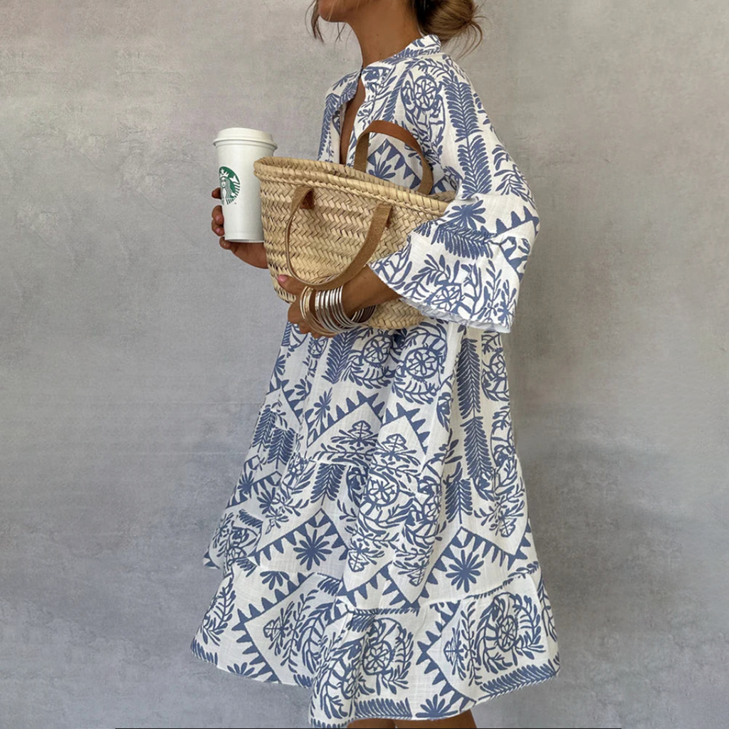 Jesie-London Bethany women's boho patterned long sleeve mini dress with flowing fabric and stylish design.