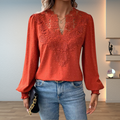 Jesie-London Darcey women's V-neck long sleeve blouse with floral details, featuring a stylish and elegant design.