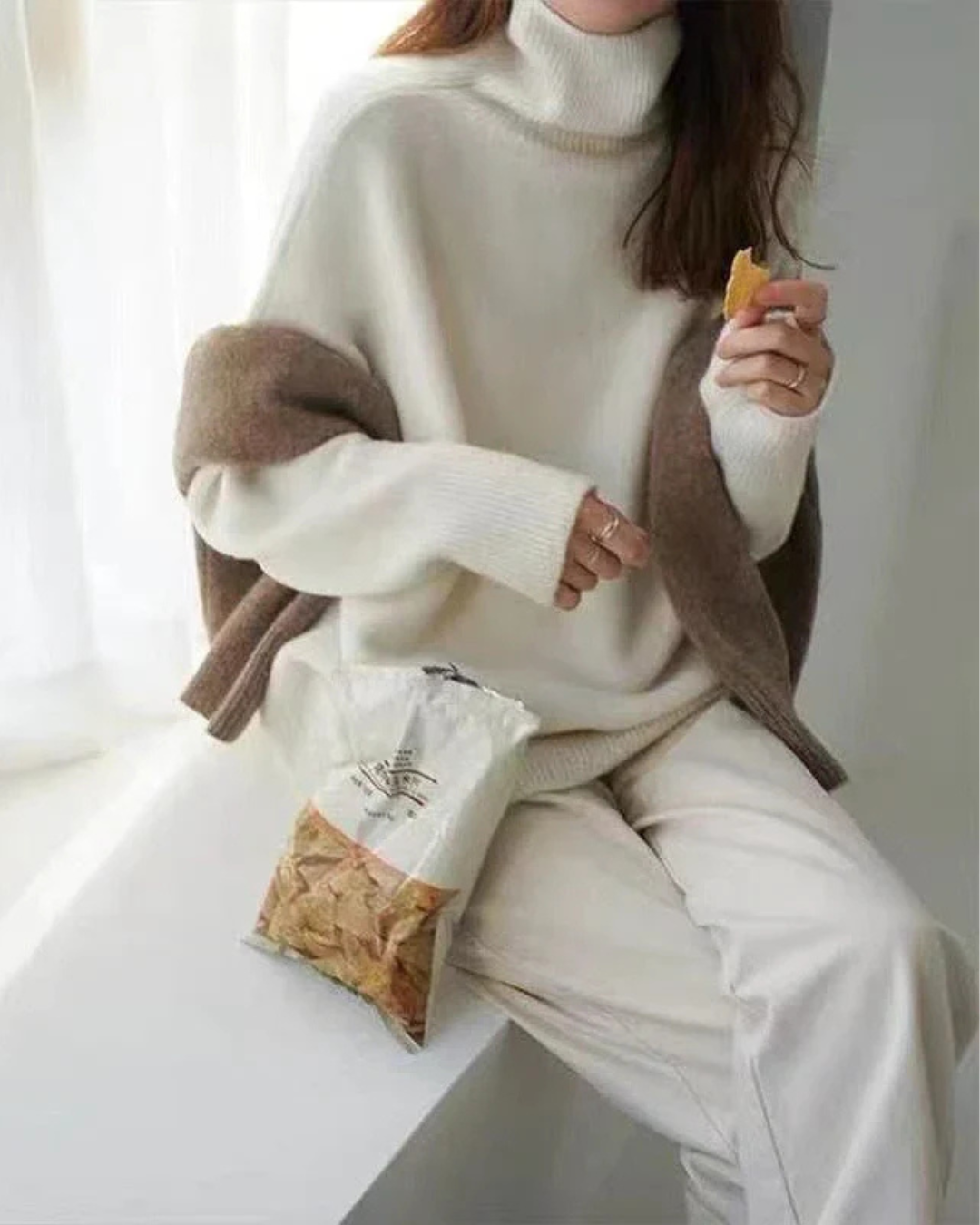 Jesie-London Amelia women's oversized turtleneck casual sweater in cozy knit, shown in a neutral color, relaxed fit design.