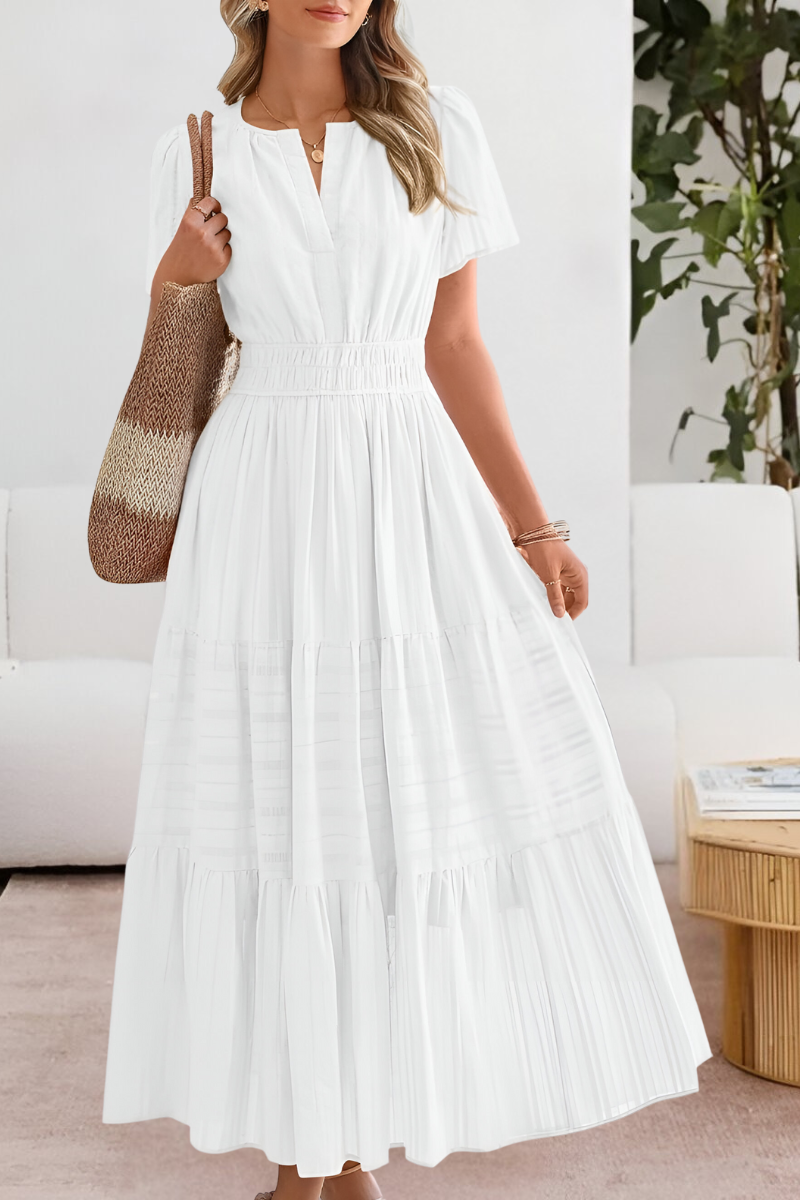 Jesie-London Alice women's boho short sleeve smocked midi dress, lightweight fabric with floral pattern and relaxed fit.