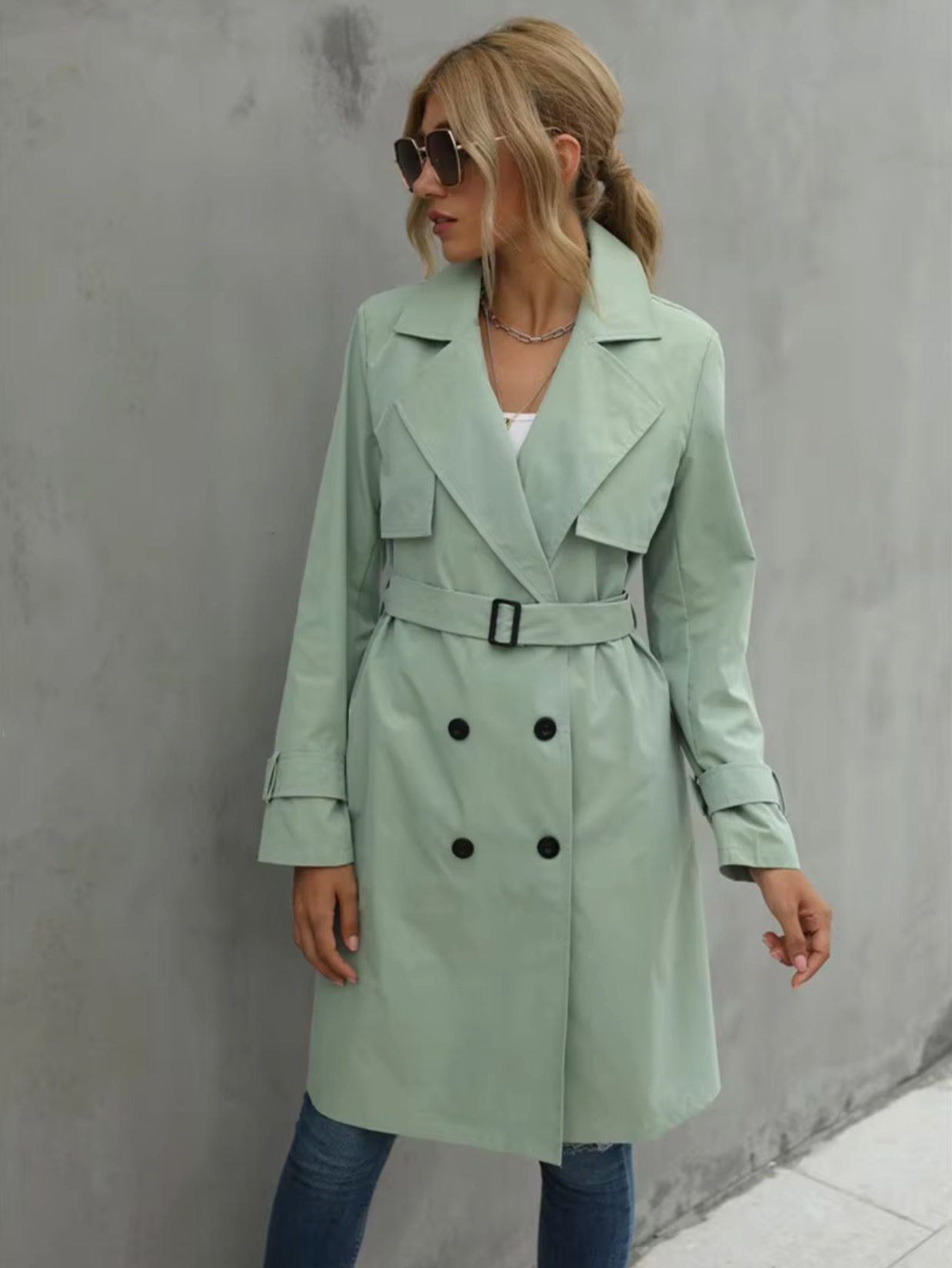Jesie-London Stella women's trench coat with double buttons and a belt, shown with a classic beige fabric and stylish design