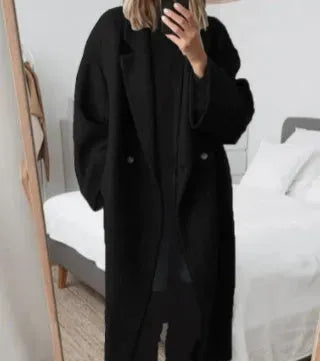 Eva women's relaxed fit long coat by Jesie-London, in a chic style perfect for stylish, comfortable winter wear.