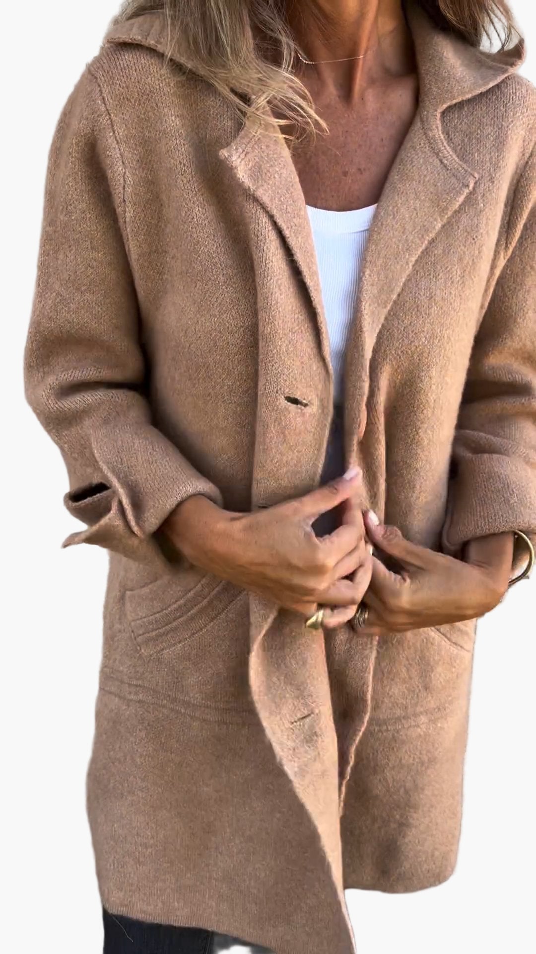 Women’s cozy oversized button-down trench coat by Jesie-London with a relaxed fit and classic design, shown in neutral fabric.