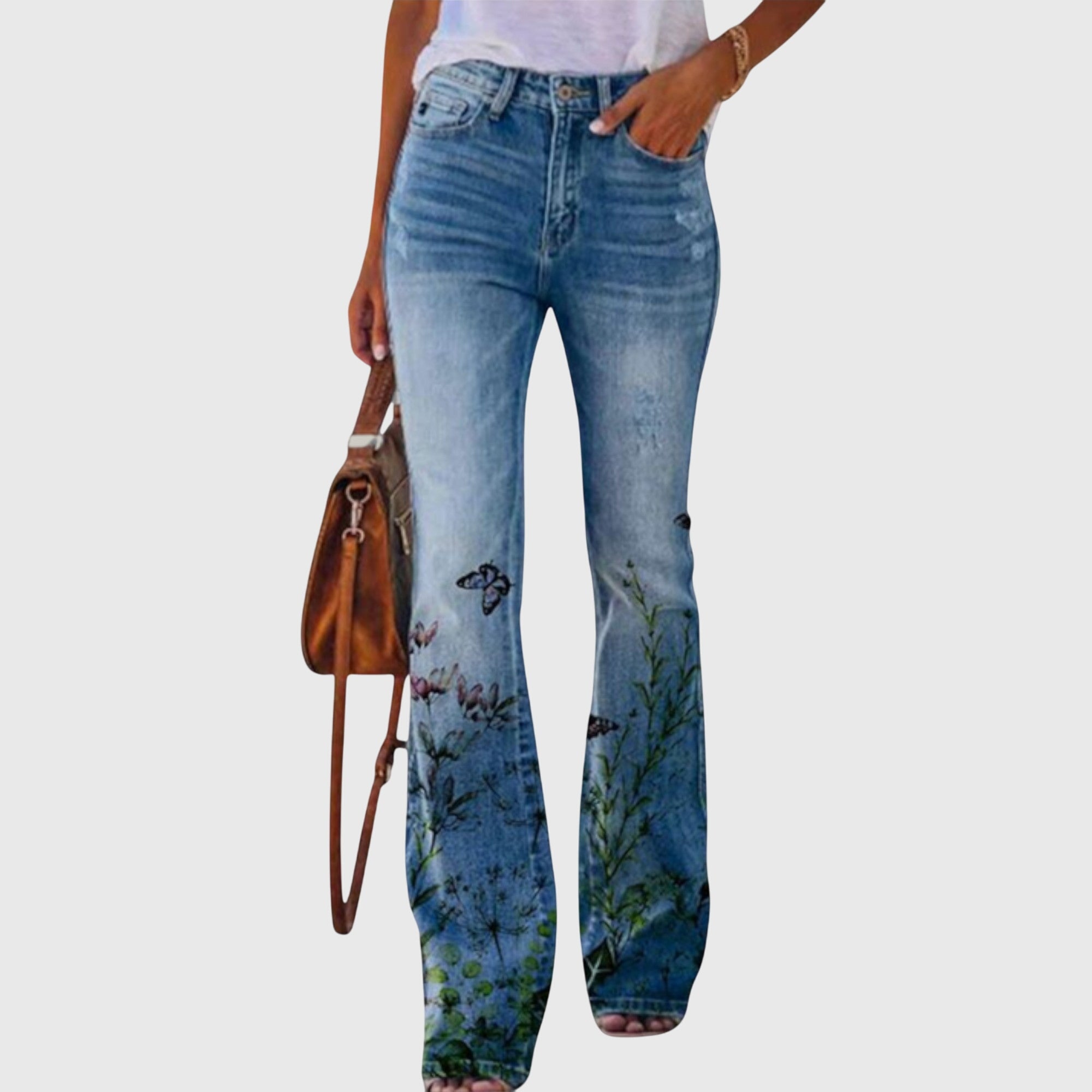 Women’s floral printed skinny jeans from Jesie-London with a fitted style and vibrant floral pattern.