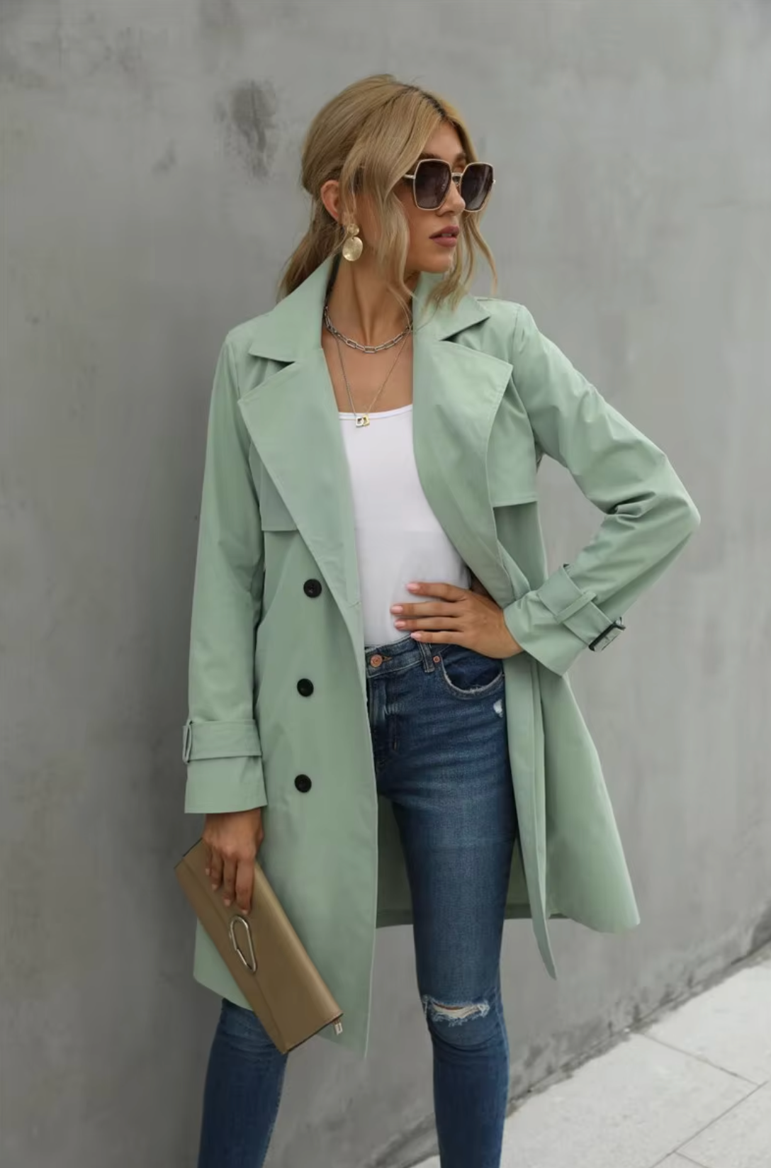 Jesie-London Stella women's trench coat with double-breasted buttons and belt, shown in a stylish beige fabric.