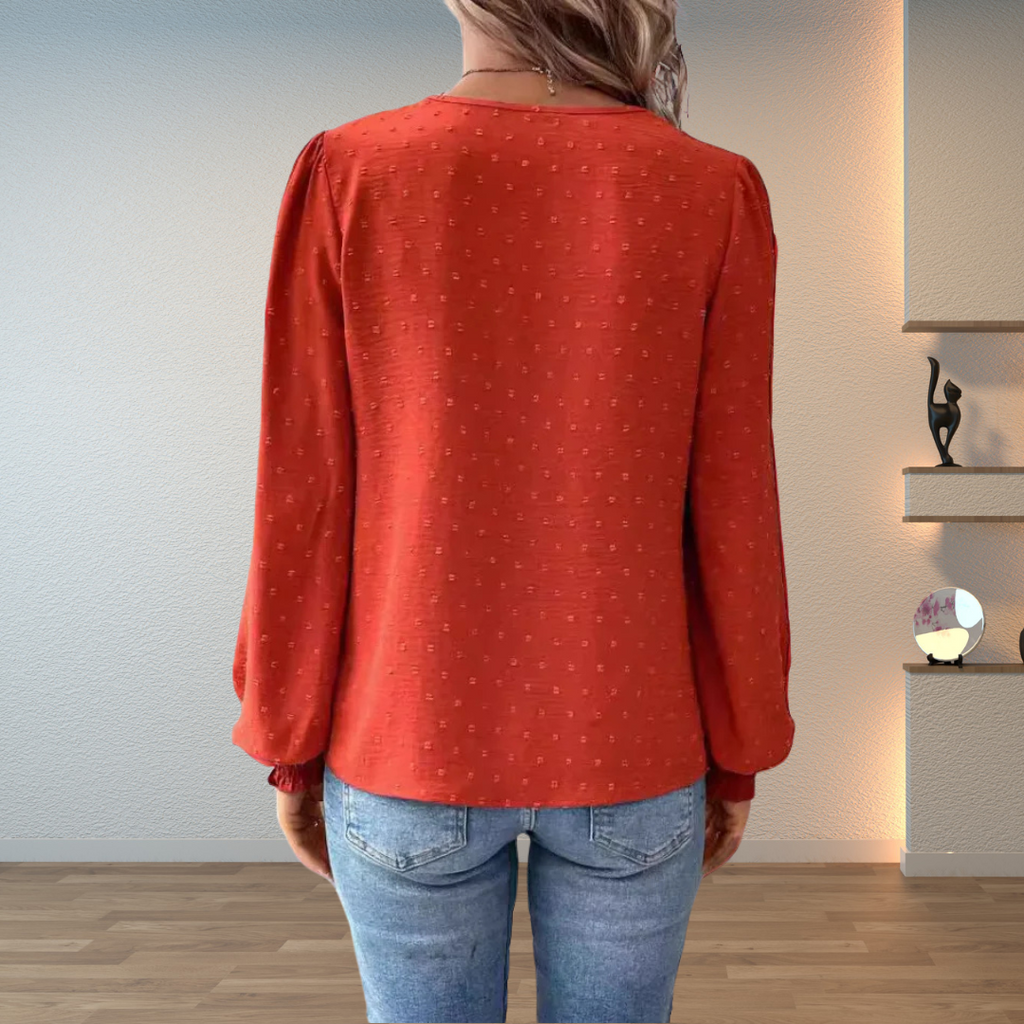 Jesie-London Darcey women's V-neck long sleeve floral blouse top with detailed floral pattern and elegant design.