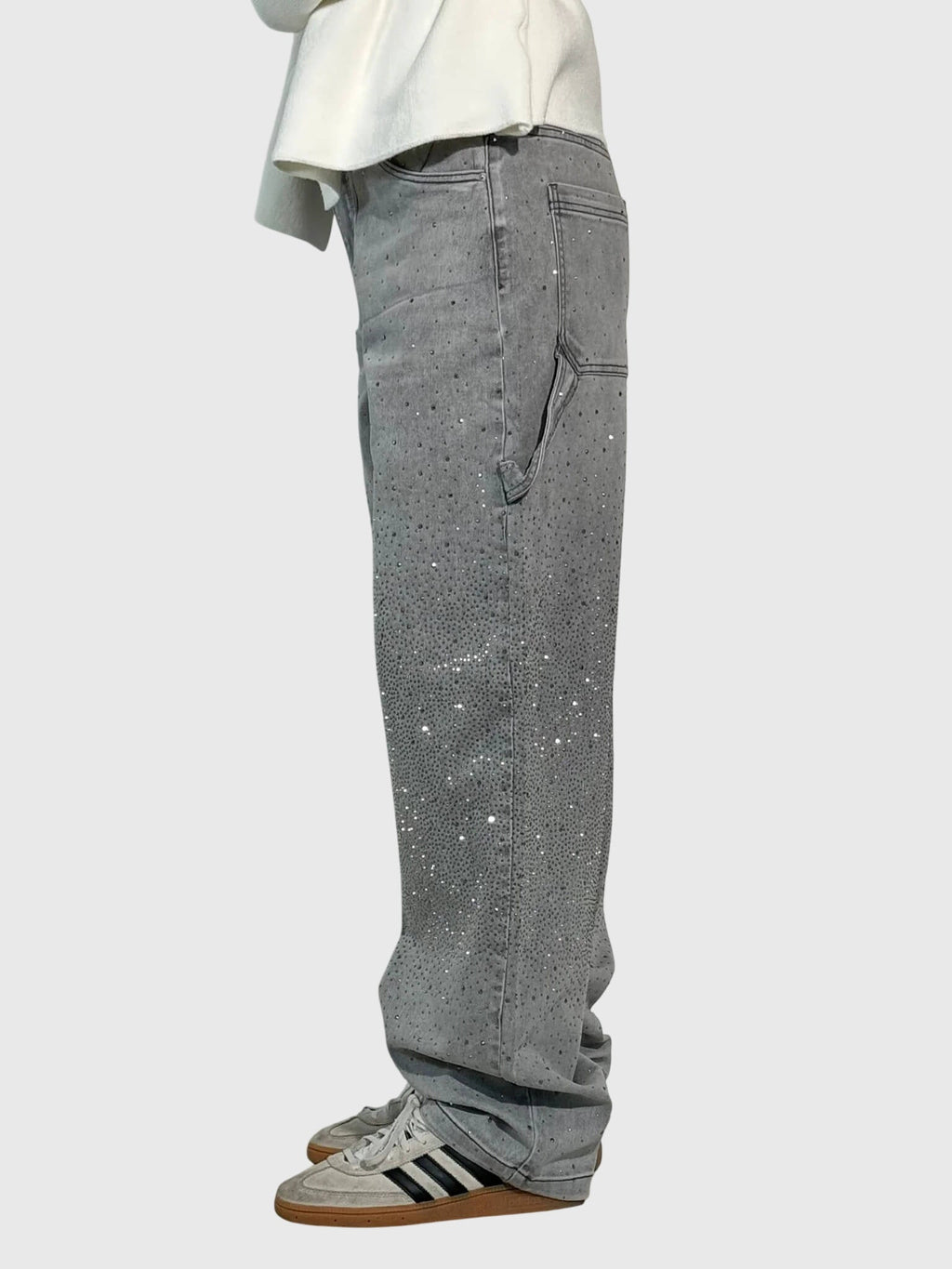 Women’s sparkly diamond denim pants by Jesie-London featuring glittering embellishments and a stylish fit.