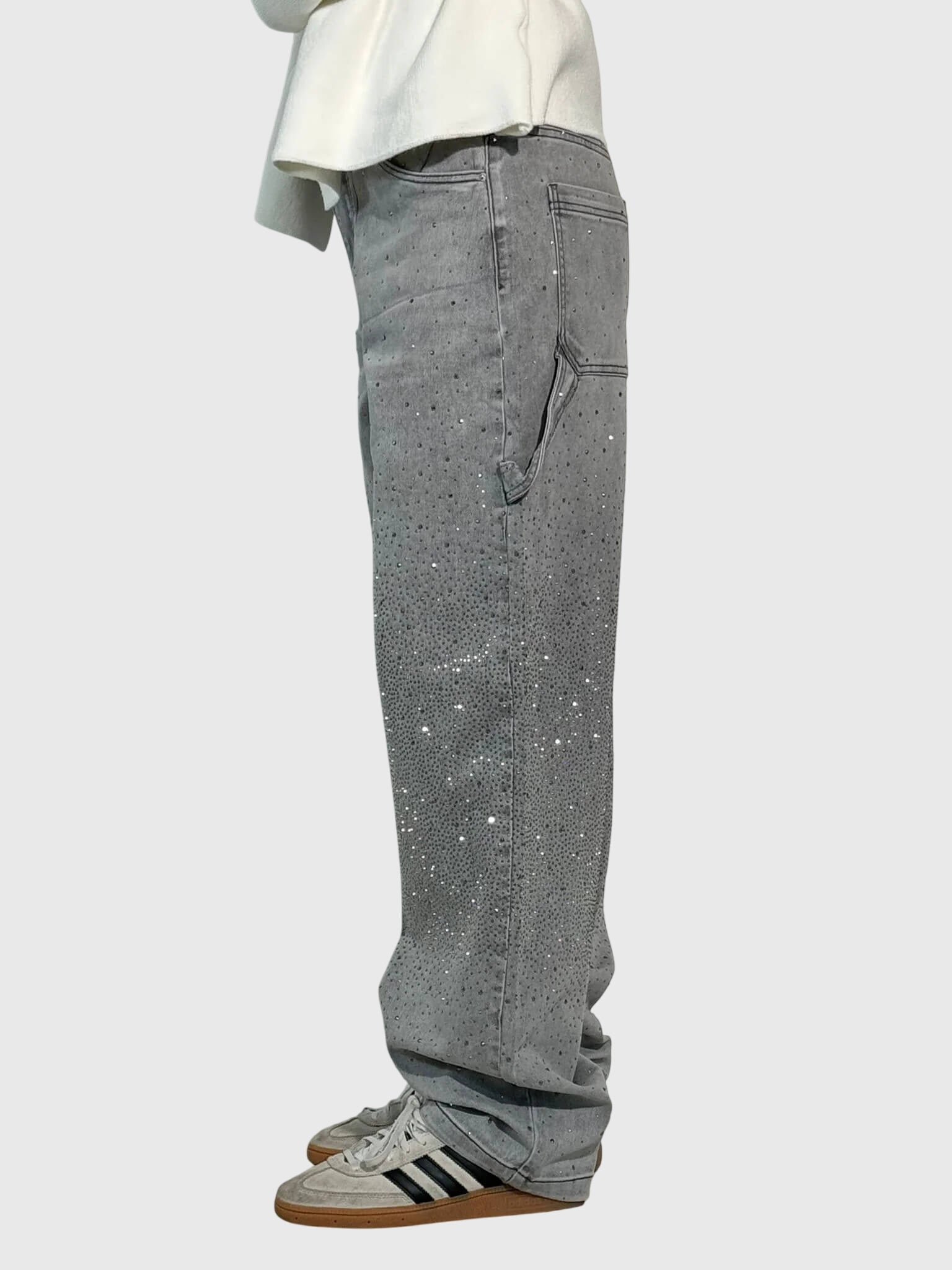 Women’s sparkly diamond denim pants by Jesie-London featuring glittering embellishments and a stylish fit.
