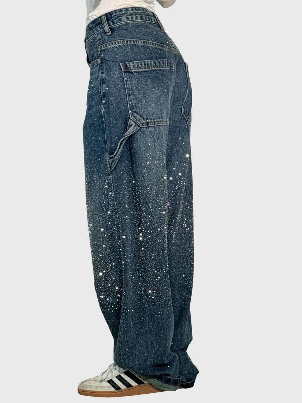Women’s sparkle diamond denim pants by Jesie-London featuring shiny embellishments and a classic denim fit.