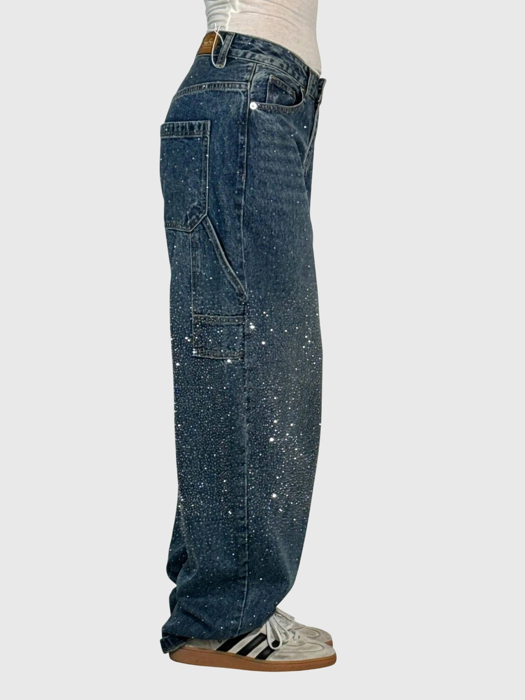 Women’s sparkle diamond denim pants from Jesie-London, featuring shiny embellishments and a stylish fit.