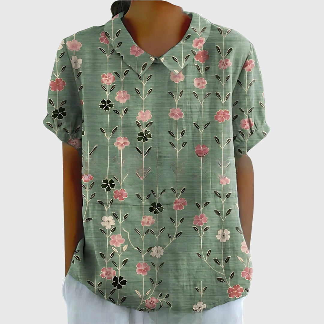 Jesie-London Eleanor women's floral collar short sleeve blouse with delicate floral print and classic design.