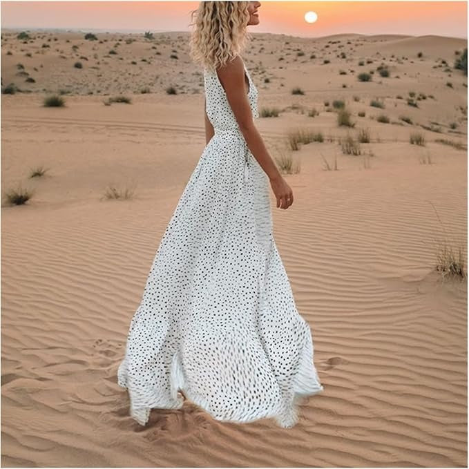 Jesie-London Catherine women's boho sleeveless V-neck maxi dress displayed on a hanger. Flowing fabric and boho style.
