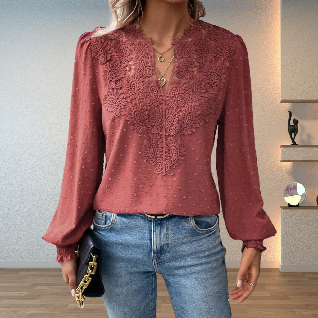 Jesie-London Darcey women's V-neck long sleeve blouse with floral detailing, featuring a relaxed fit and elegant design.