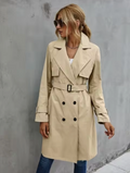 Jesie-London Stella women's trench coat with double-breasted buttons and a belt, shown in a stylish, classic design.