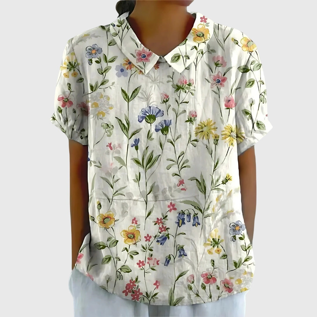 Eleanor women's floral collar short sleeve blouse by Jesie-London, featuring a stylish floral pattern and classic short sleeves.