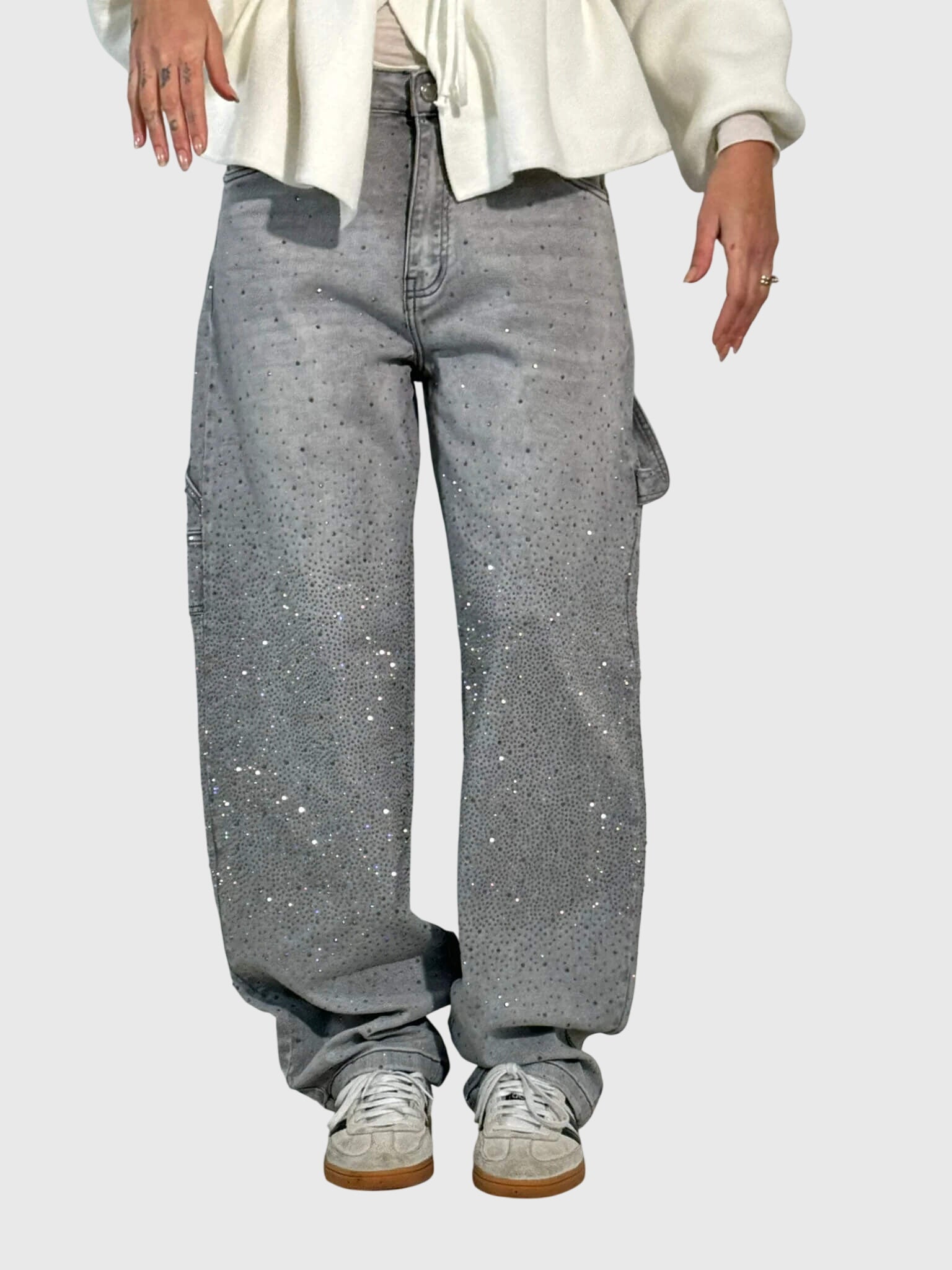 Women’s sparkle diamond denim pants by Jesie-London featuring embellished details and a trendy fit.