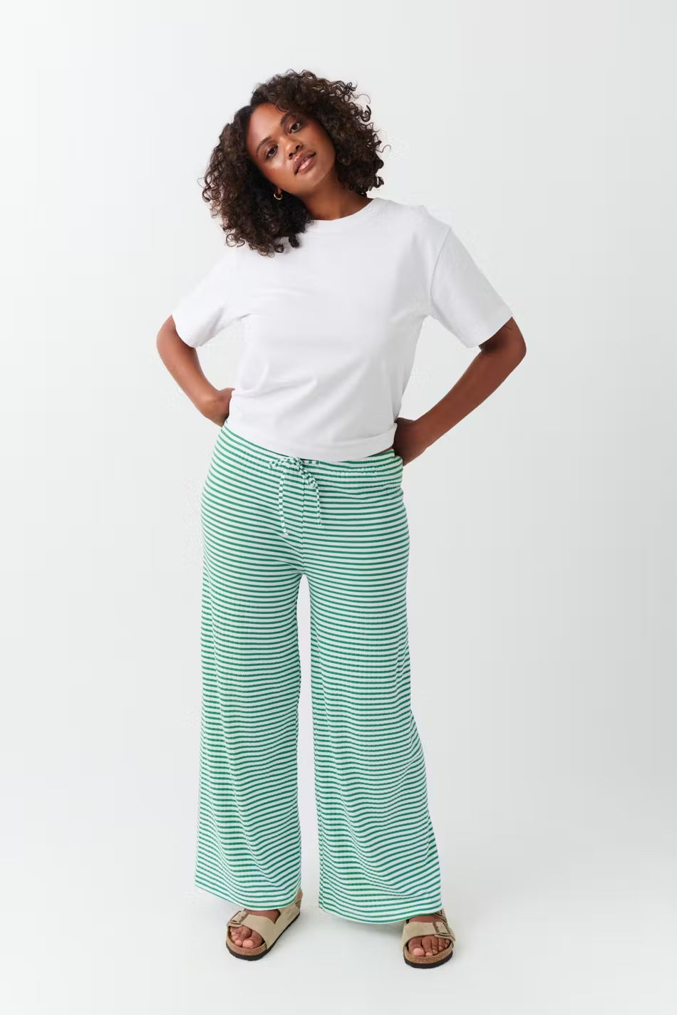 Women’s relaxed spring striped pants by Jesie-London, featuring a comfortable fit and stylish design.