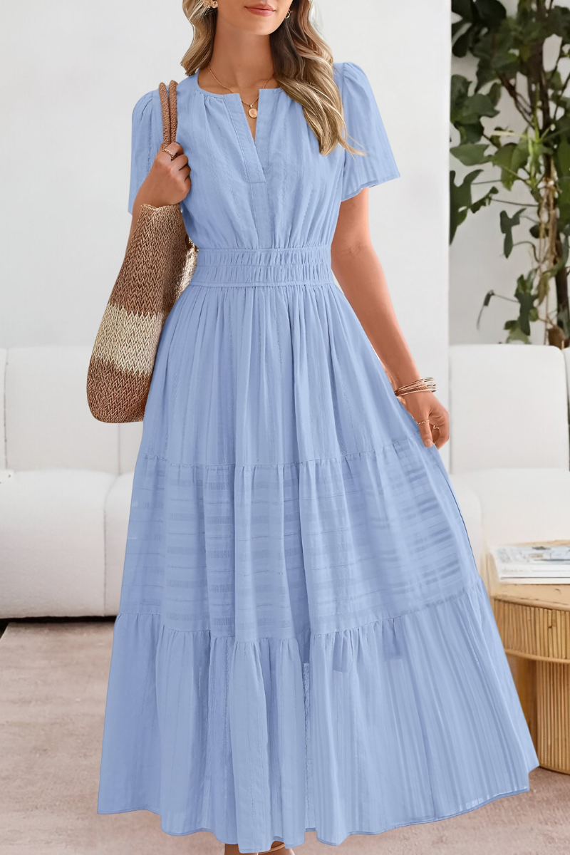 Jesie-London Alice women's boho short sleeve smocked midi dress featuring a flowy, relaxed fit with a stylish, casual design.