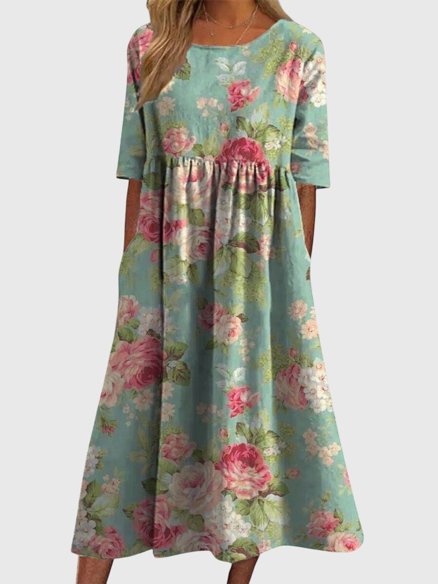 Jesie-London Ruby women's vintage floral midi dress with a feminine design and intricate floral pattern.