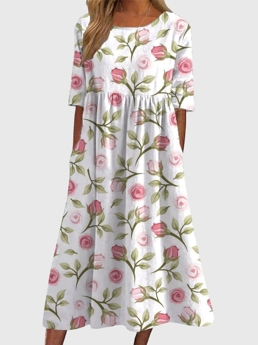 Jesie-London Ruby women's vintage floral midi dress with a fitted waist and flowing skirt, perfect for spring and summer occasions.