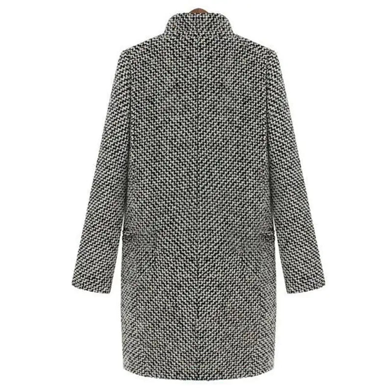 Women’s vintage-inspired houndstooth coat by Jesie-London, featuring classic pattern and tailored fit for timeless style.