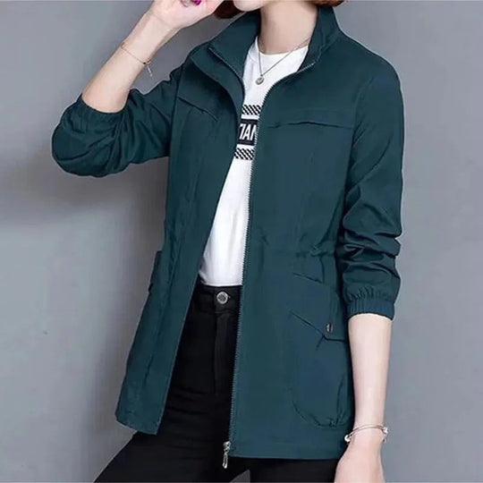 Women’s lightweight waterproof trench coat by Jesie-London, khaki color, mid-length, adjustable waist, casual windbreaker for spring.