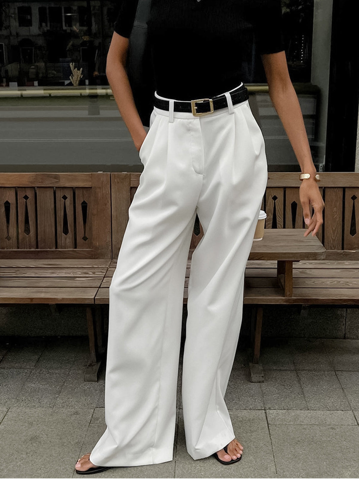 Women’s relaxed-fit wide-leg office trousers by Jesie-London, featuring a stylish, comfortable design in a neutral color.