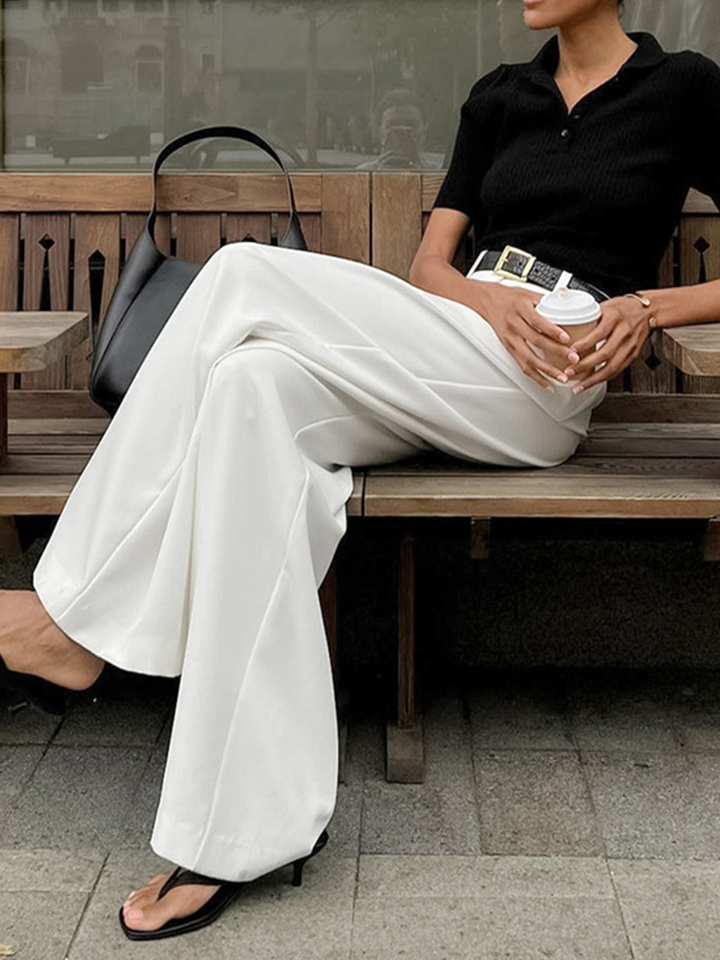 Julia women's relaxed-fit wide-leg office trousers by Jesie-London, shown in a neutral color, with a high waist and tailored fit.